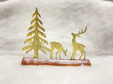 Load image into Gallery viewer, Handmade Christmas gold scene with two reindeers and Christmas tree on a wooden log 27 x 5 x 22cm
