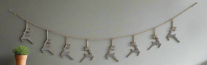 Handmade powder coated hanging silver reindeer garland measuring 150 x 22x 1cm