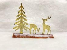 Load image into Gallery viewer, Handmade Christmas gold scene with two reindeers and Christmas tree on a wooden log 27 x 5 x 22cm
