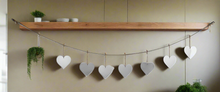 Load image into Gallery viewer, Handmade powder coated hanging silver heart garland measuring 150 x 20 x 1cm
