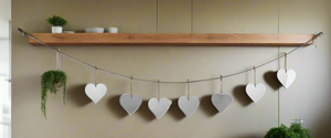 Handmade powder coated hanging silver heart garland measuring 150 x 20 x 1cm