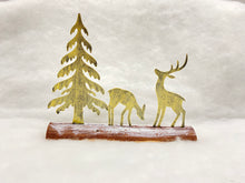 Load image into Gallery viewer, Handmade Christmas gold scene with two reindeers and Christmas tree on a wooden log 27 x 5 x 22cm
