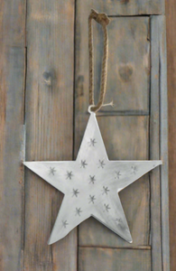 Handmade powder coated hanging white star measuring 45 x 45 x 1cm