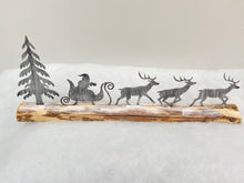 Indlæs billede til gallerivisning Handmade Christmas silver sleigh and reindeers with Christmas tree on a wood log 46 x 5 x 17cm
