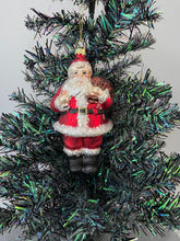 Afbeelding in Gallery-weergave laden, Glass Santa Claus holding a sack/Father Christmas Christmas bauble tree hanging decoration/christmas/seasonal/ glass hanging item
