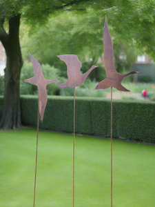 Three large rusty Flying Geese Garden Art on poles measuring 25 x 16.5 cm for garden/outdoor.