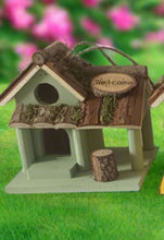 Load image into Gallery viewer, Handmade wooden coloured birdhouse hut with circular window and doorway measuring 15x11x14cm - Marissa&#39;s Garden &amp; Gift
