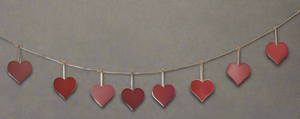 Handmade powder coated hanging red heart garland measuring 150 x 20 x 1cm - Marissa's Garden & Gift