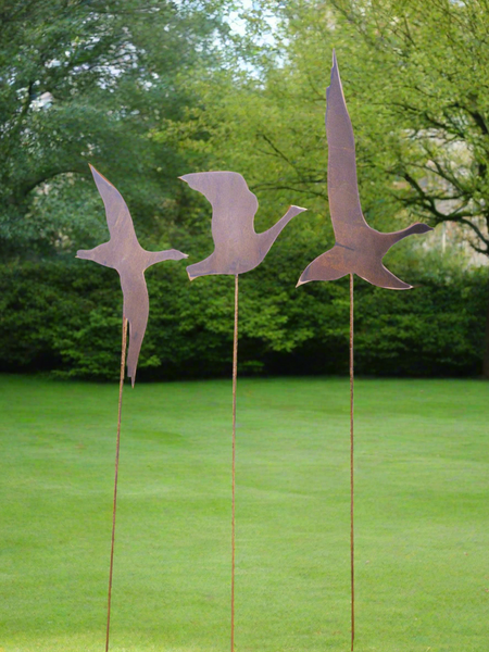 Three large rusty Flying Geese Garden Art on poles measuring 25 x 16.5 cm for garden/outdoor.