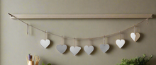 Load image into Gallery viewer, Handmade powder coated hanging silver heart garland measuring 150 x 20 x 1cm
