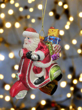 Charger l&#39;image dans la galerie, Glass Santa Claus on a motorbike /Father Christmas Christmas bauble tree hanging decoration/christmas/seasonal/ glass hanging item
