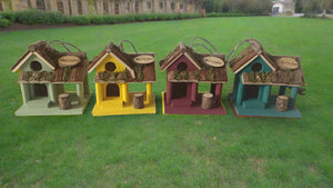 Handmade wooden coloured birdhouse hut with circular window and doorway measuring 15x11x14cm - Marissa's Garden & Gift