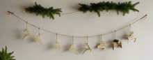 Load image into Gallery viewer, Handmade powder coated hanging gold reindeer garland measuring 150 x 22x 1cm
