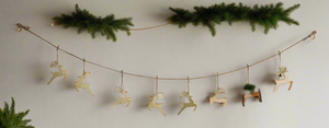 Handmade powder coated hanging gold reindeer garland measuring 150 x 22x 1cm