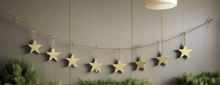 Load image into Gallery viewer, Handmade powder coated hanging gold heart garland measuring 150 x 20 x 1cm
