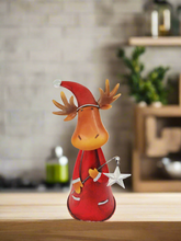 Load image into Gallery viewer, Handmade nodding reindeer with Christmas star measuring 15 x 10 x 25cm
