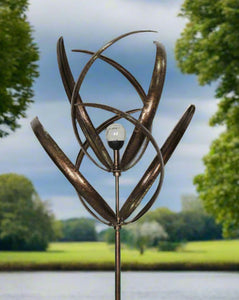 knightsbridge Bronze windsculpture/windspinner with solar bulb measuring 61 x 61 x 208cm