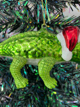 Load image into Gallery viewer, Glass Christmas crocodile with bauble in mouth Christmas bauble tree hanging decoration/christmas/seasonal/ glass hanging item
