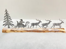 Load image into Gallery viewer, Handmade Christmas silver sleigh and reindeers with Christmas tree on a wood log 46 x 5 x 17cm
