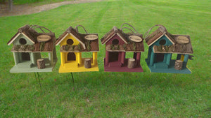 Handmade wooden coloured birdhouse hut with circular window and doorway measuring 15x11x14cm - Marissa's Garden & Gift