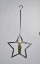 Load image into Gallery viewer, Handmade powder coated hanging silver star with reindeer measuring 27 x 25 x 1cm
