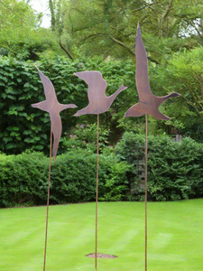 Three large rusty Flying Geese Garden Art on poles measuring 25 x 16.5 cm for garden/outdoor.