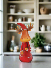 Load image into Gallery viewer, Handmade nodding reindeer with Christmas star measuring 15 x 10 x 25cm
