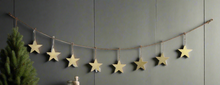 Load image into Gallery viewer, Handmade powder coated hanging gold heart garland measuring 150 x 20 x 1cm
