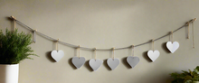 Laden Sie das Bild in den Galerie-Viewer, Handmade powder coated hanging silver heart garland measuring 150 x 20 x 1cm
