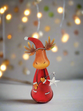 Load image into Gallery viewer, Handmade nodding reindeer with Christmas star measuring 15 x 10 x 25cm
