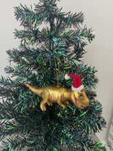 Load image into Gallery viewer, Glass Christmas dinosaur with hat Christmas bauble tree hanging decoration/christmas/seasonal/ glass hanging item
