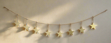 Load image into Gallery viewer, Handmade powder coated hanging gold heart garland measuring 150 x 20 x 1cm
